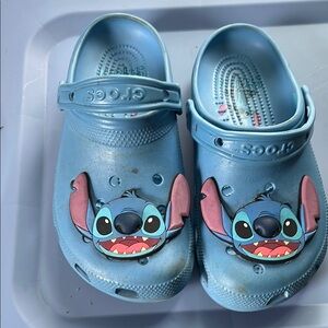 CROCS Blue and Pink Slippers with Playful Stitch Design